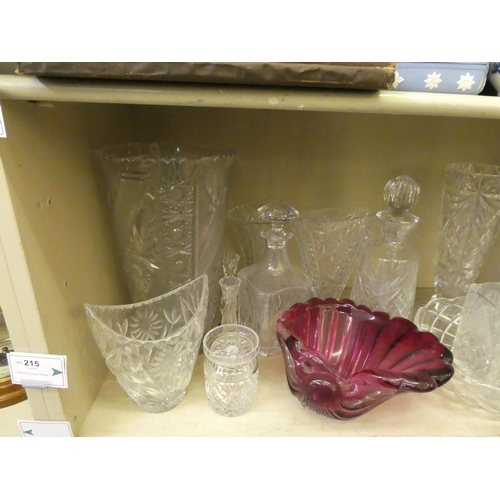 215 - Decorative and functional glassware: to include decanters; and vases  largest 13.5