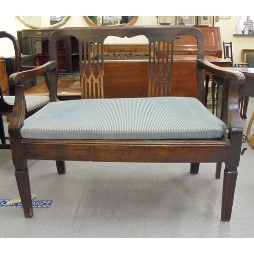 219 - Small furniture: to include a 19thC mahogany, two person chair back settee with a splat back, raised... 