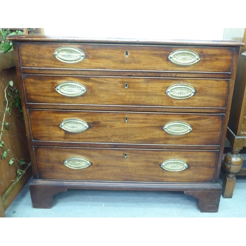 222 - A George III mahogany dressing chest with four long drawers, raised on bracket feet  32