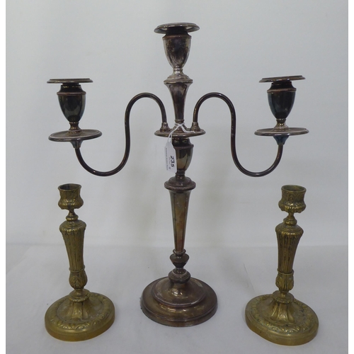 235 - A silver plated three branch candelabra, decorated with beading  17.5