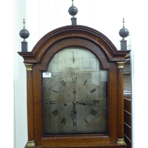 246 - An early 20thC oak longcase clock; the 8 day movement faced by a metal Roman dial  80