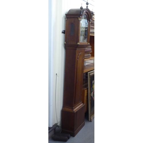 246 - An early 20thC oak longcase clock; the 8 day movement faced by a metal Roman dial  80