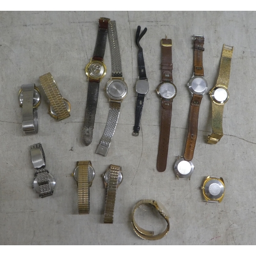 254 - Variously cased and strapped wristwatches: to include manual wind examples