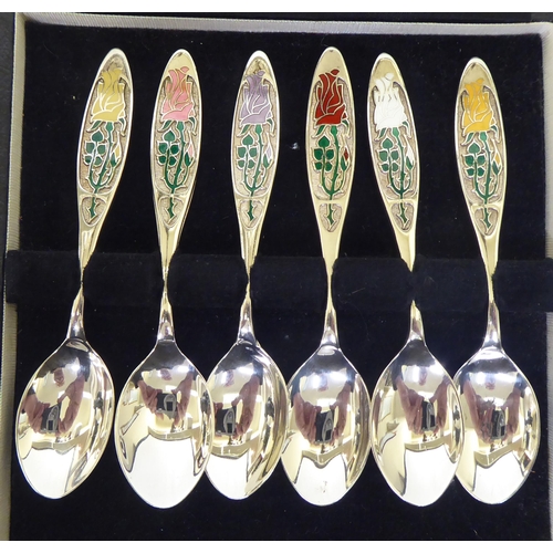 270 - A set of six silver 'Year of the Roses' themed teaspoons  Birmingham 1976  boxed