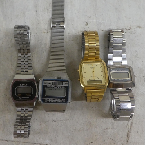 286 - Variously cased and strapped vintage digital watches