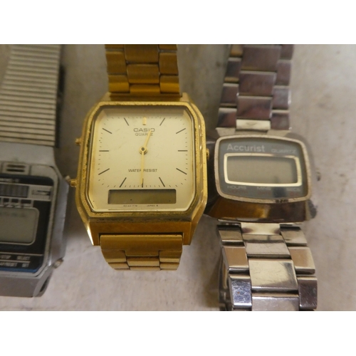 286 - Variously cased and strapped vintage digital watches