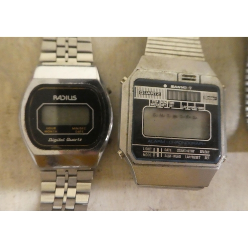 286 - Variously cased and strapped vintage digital watches