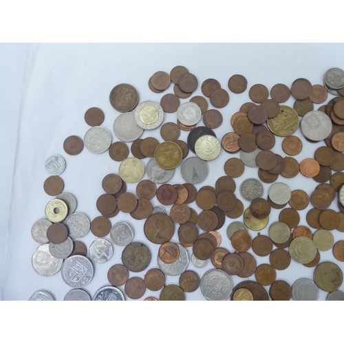 291 - Uncollated coins and banknotes: to include a 1940s South African five shilling 