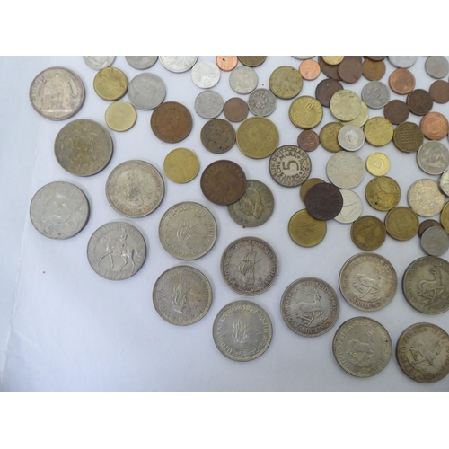 291 - Uncollated coins and banknotes: to include a 1940s South African five shilling 