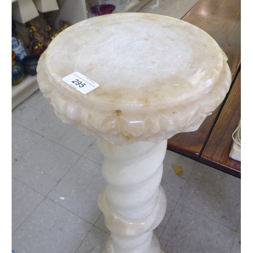 295 - A 20thC onyx pedestal  41