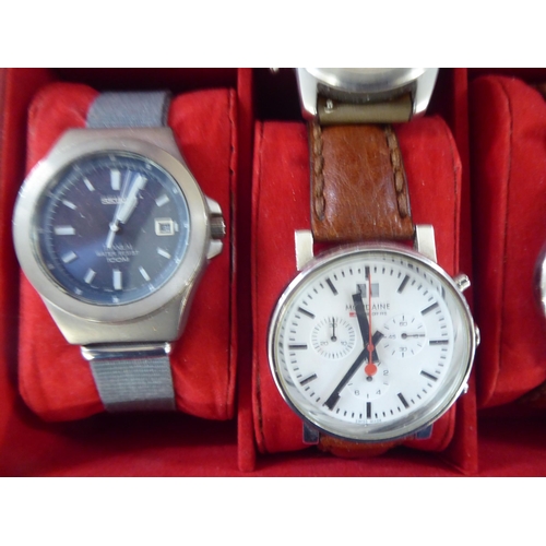 55 - Nine modern stainless steel cased wristwatches: to include Seiko, Timex and various straps, in a com... 