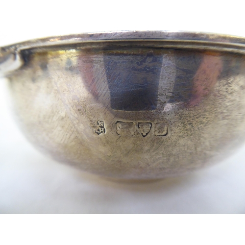 62 - An Edwardian silver twin handled and footed quaiche  marks rubbed  4.5