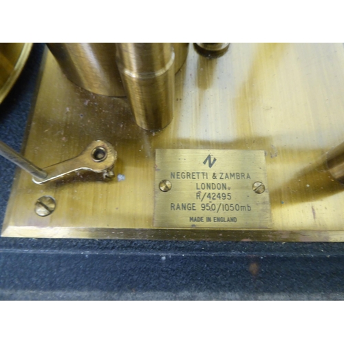 75 - A Negretti and Zambra barograph No.R/42495, in a glass case  10