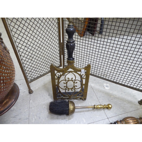 79 - Hearth accessories: to include a 1920s copper coal scuttle  13.5