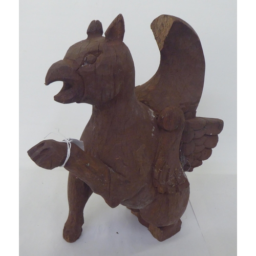 87 - Carved wooden figures: to include a hippogryph  14