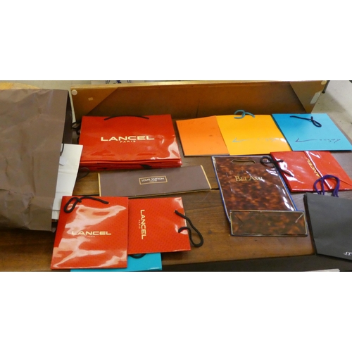 97 - Hermes and other branded bags; and a Hermes catalogue