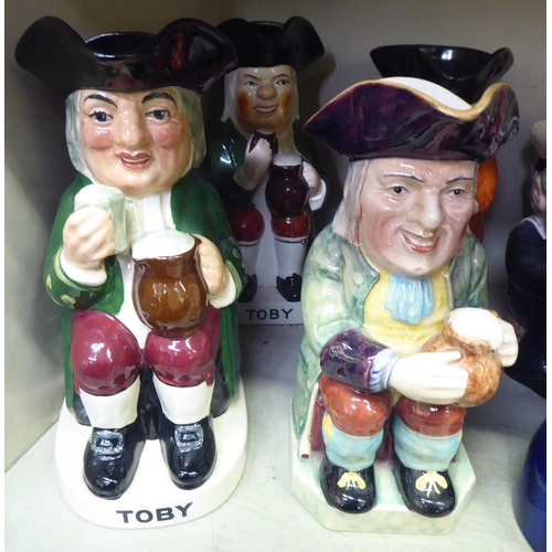 99 - Toby jugs: to include an example by Royal Doulton  9.5