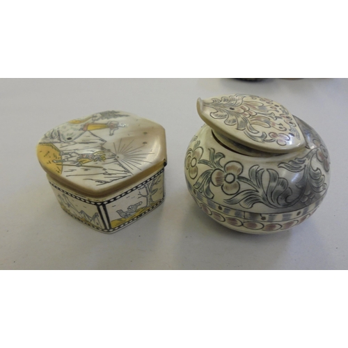 218 - A mixed lot: to include a carved bone pillbox, decorated with birds and flora  1.5