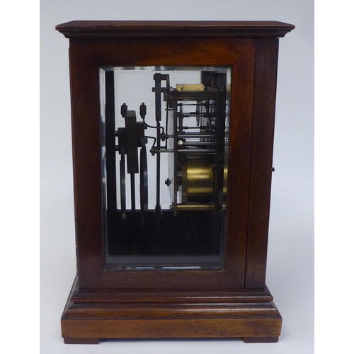 10 - A late 19th/early 20thC mahogany cased cube design mantel clock with straight sides and bevelled gla... 