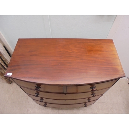 113 - A mid Victorian mahogany bow front dressing chest, comprising two short/three graduated long drawers... 