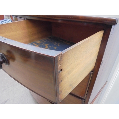 113 - A mid Victorian mahogany bow front dressing chest, comprising two short/three graduated long drawers... 