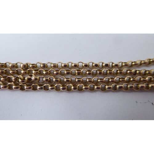 128 - A Victorian gold coloured metal guard chain, on a later 9ct gold tag and clip