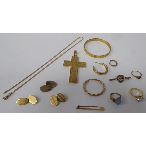 133 - Yellow metal items of personal ornament: to include a filigree worked pendant cross; and a pair of t... 