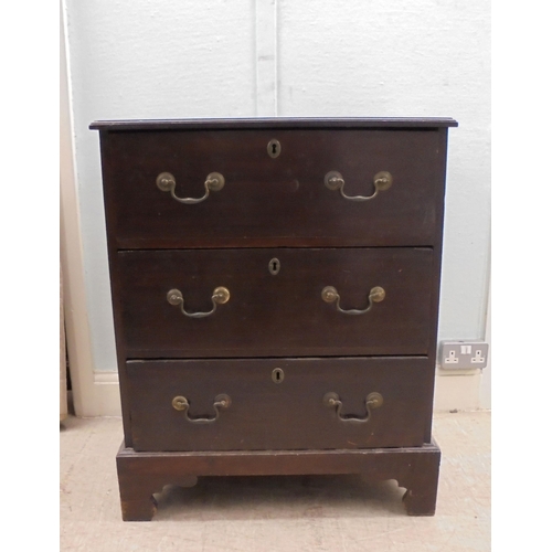 140 - A 19thC mahogany three deep drawer pedestal chest with cast brass bail handles, raised on bracket fe... 