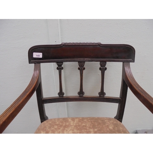 149 - An early 19thC mahogany framed chair with a rope carved bar crest, a triple bar splat back and reede... 