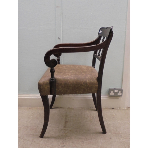 149 - An early 19thC mahogany framed chair with a rope carved bar crest, a triple bar splat back and reede... 