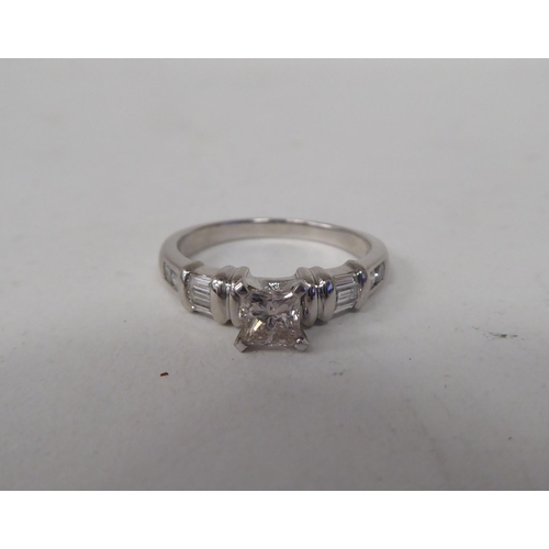 164 - A platinum and diamond set ring  boxed