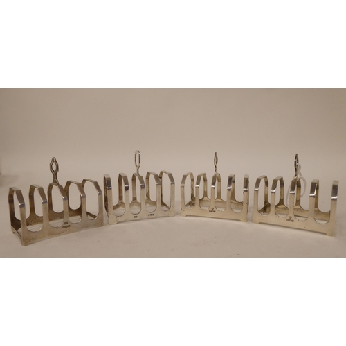 188 - Four similar silver four division toast racks  mixed marks  (combined weight approx. 5ozs)