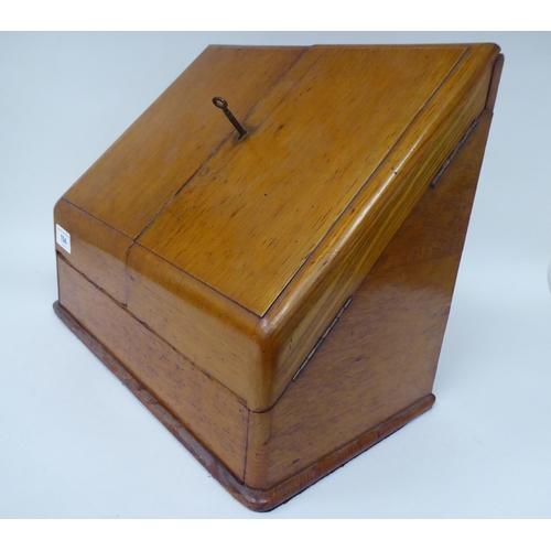 194 - A late Victorian/Edwardian Partridge & Cooper of Fleet Street, London, honey coloured oak deskto... 