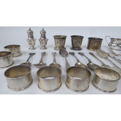 204 - Silver items: to include napkin rings; presentation and condiments spoons  mixed marks 