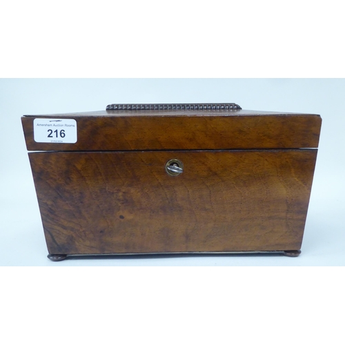 216 - A William IV rosewood sarcophagus shape tea casket with carved bead border ornament, the lockable hi... 