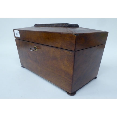 216 - A William IV rosewood sarcophagus shape tea casket with carved bead border ornament, the lockable hi... 