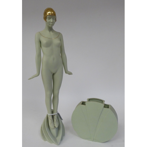 229 - Attributed to Glenis Devereaux - an Art Deco watered green Parianware figure, a posing nude wearing ... 