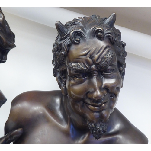 234 - Glenis Devereaux - two cast bronze busts 'Pan' and 'Syrinx'  bearing signatures  the socle... 