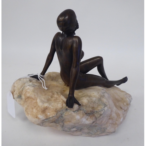 243 - After Glenis Devereaux - a cast bronze figure 'Sun Lover'  bears a signature & obscured num... 