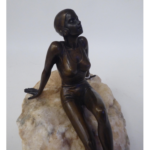 243 - After Glenis Devereaux - a cast bronze figure 'Sun Lover'  bears a signature & obscured num... 