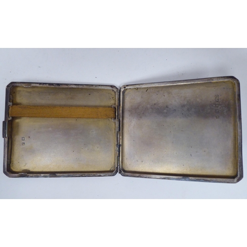 247 - Two similar silver, engine turned, folding cigarette cases, on button clasps  mixed marks