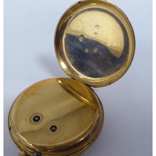 256 - An 18ct gold pocket watch, faced by a white enamel Roman dial