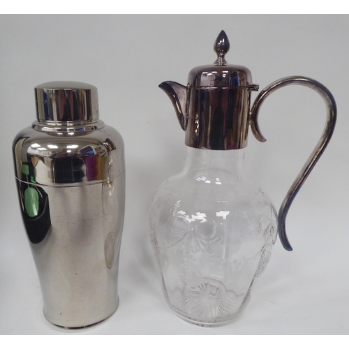 262 - Silver plated tableware: to include an Alfra cocktail shaker; flatware; and a three piece, enamelled... 