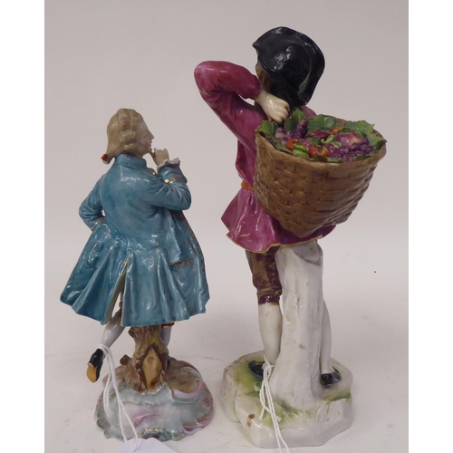 263 - Two Continental porcelain figures, a girl wearing a puce coloured tunic, carrying a basket of fruit ... 