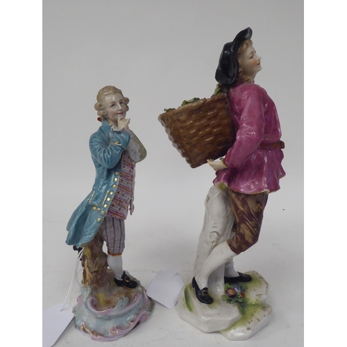 263 - Two Continental porcelain figures, a girl wearing a puce coloured tunic, carrying a basket of fruit ... 