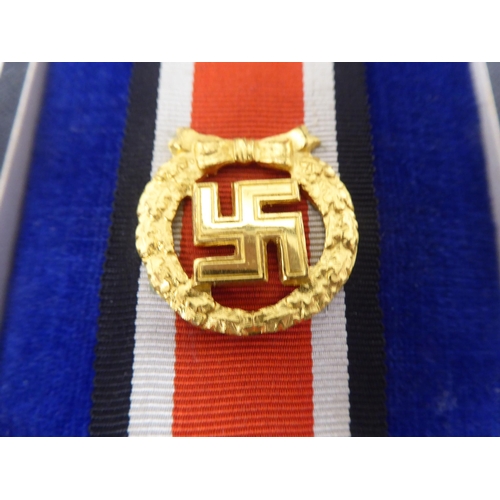 30 - A German Nazi Army Honour Roll clasp  cased  (Please Note: this lot is subject to the... 