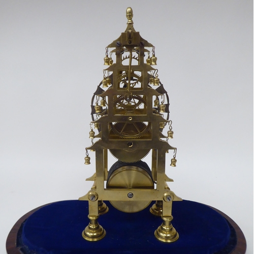 37 - A late 19thC lacquered brass skeleton clock; the movement faced by a Roman chapter ring  10