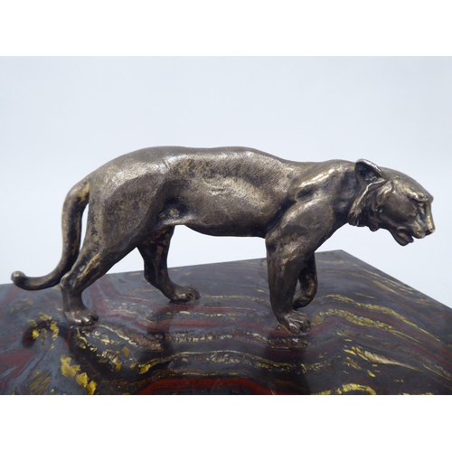 67 - A Tiger Ironstone cigarette box of shallow form with a standing, textured gilded metal big cat, poss... 