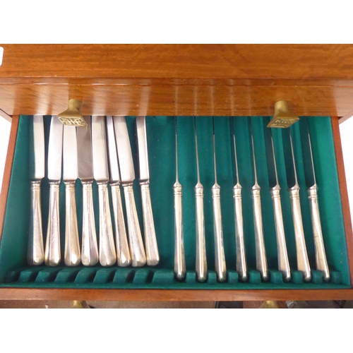 70 - A canteen of silver Hanovarian and rattail pattern flatware and cutlery, comprising eight place sett... 