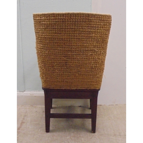 74 - A child's oak framed Orkney chair with a drop-in, woven string seat